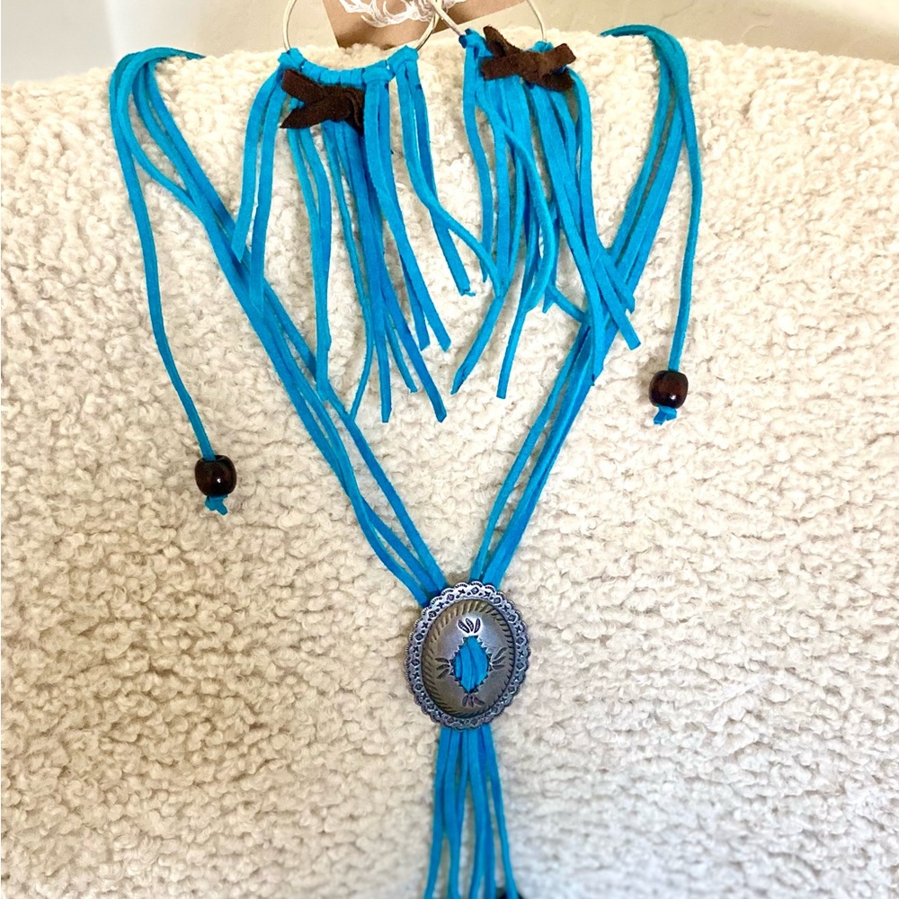 Bright turquoise blue suede cord necklace and earring set.